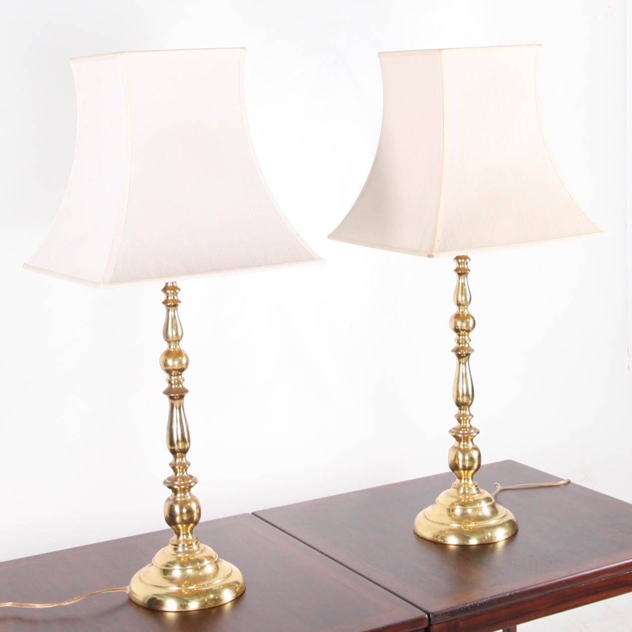 Pair of large brass lamps