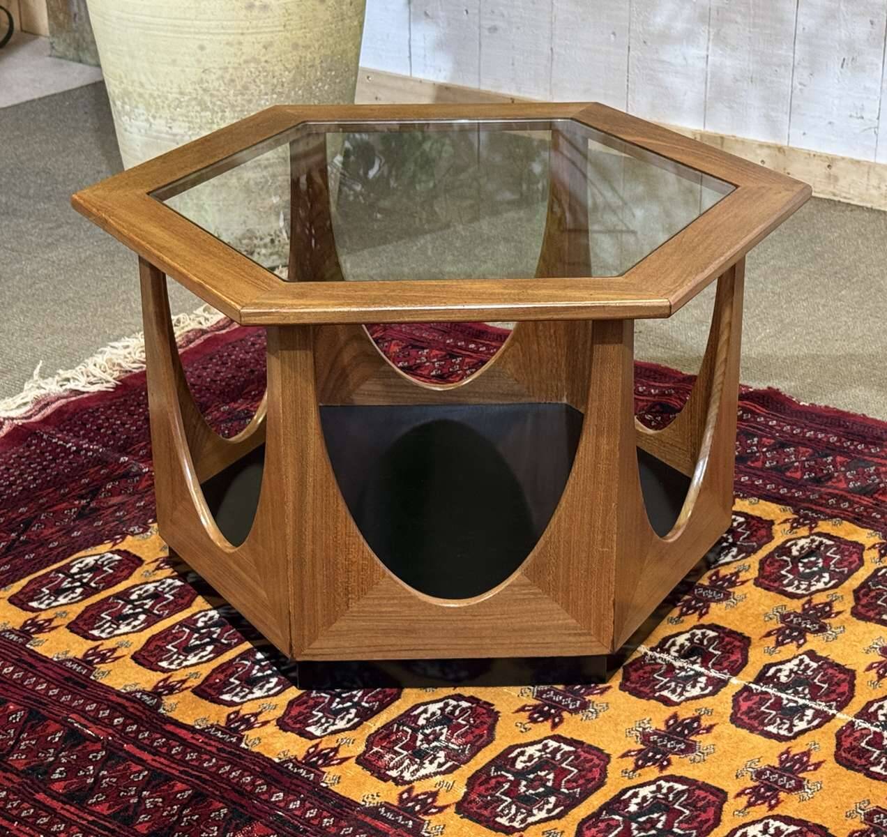 1970s octagonal GPlan gueridon in teak with a glass top.