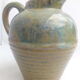 Blue enamelled sandstone pitcher and ochre streaks
