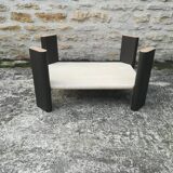 Low table in travertine and aluminium