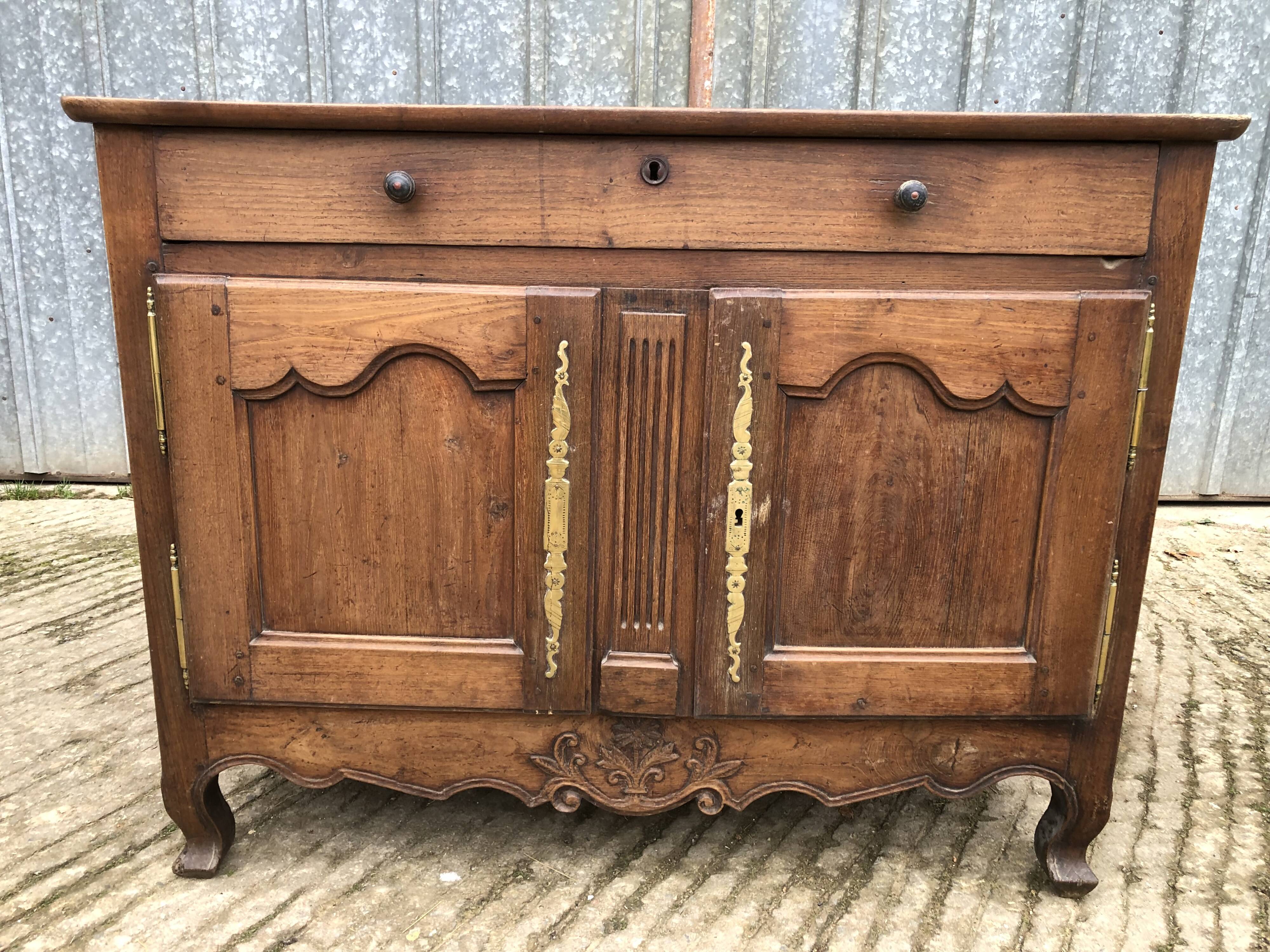 Antique Louis XV low chestnut sideboard with 2 doors and 1 drawer.