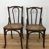 2 chairs in curved wooden and canning