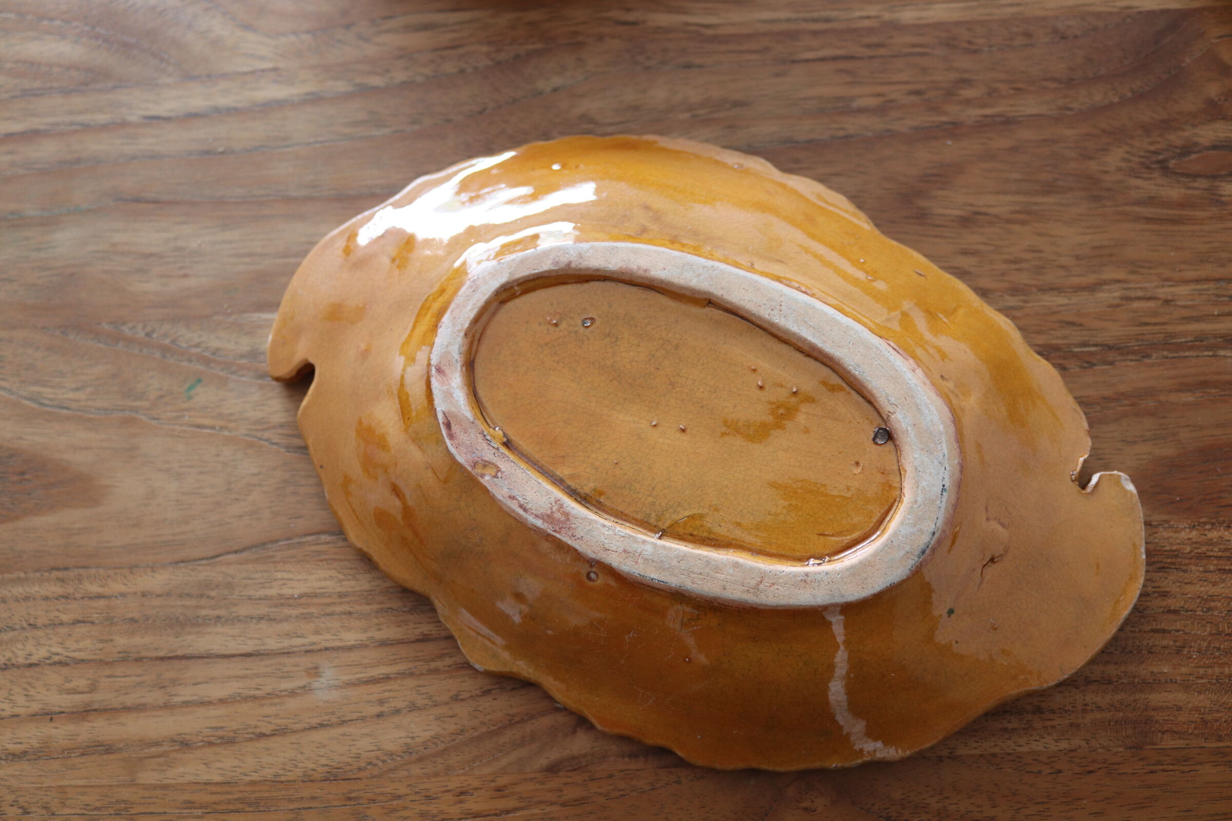 Empty pocket old ceramic sheets enamelled mustard yellow