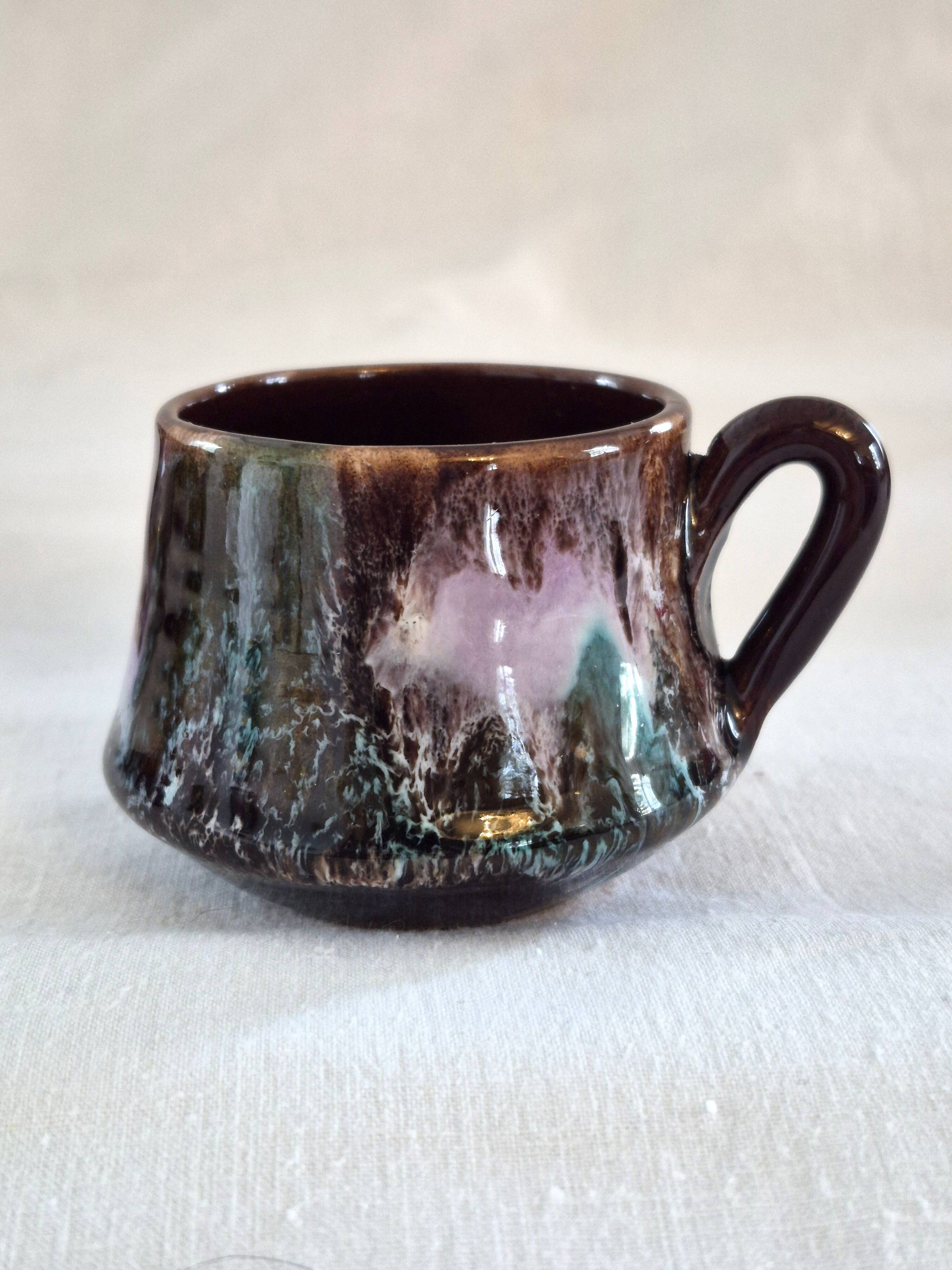 Six cups and saucers Vallauris glazed ceramic in brown and old pink.