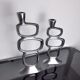 Pair of circle candlesticks by matthew hilton, england, 1980
