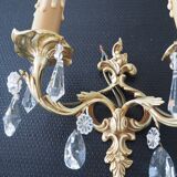Pair of gilded bronze sconces and crystal pendants