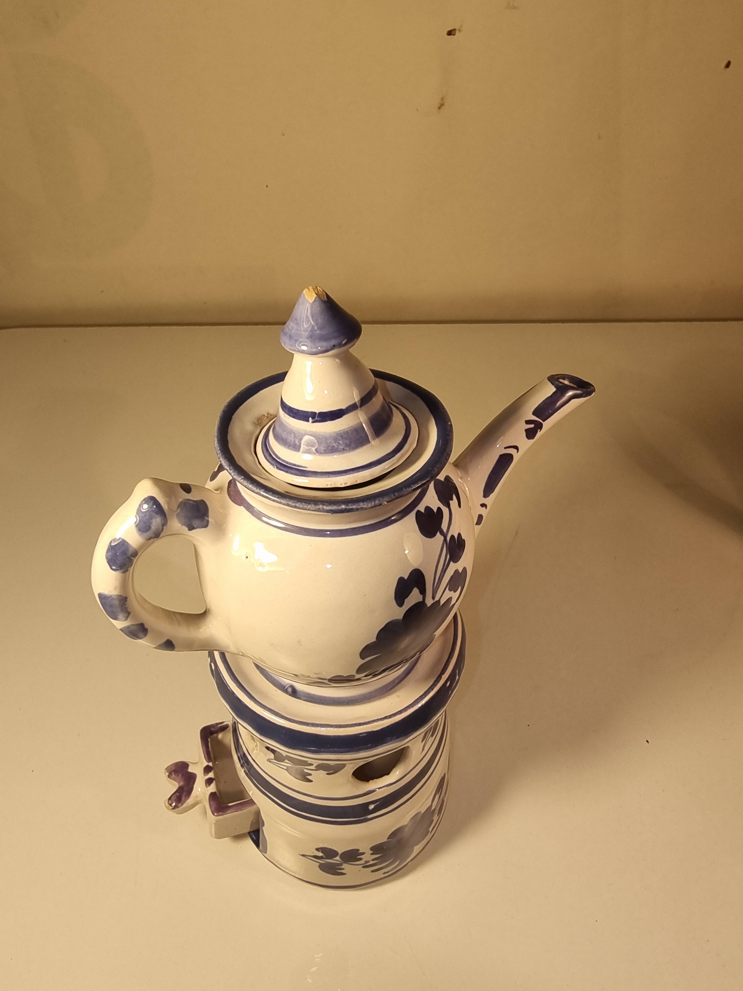 Vintage teapot in earthenware