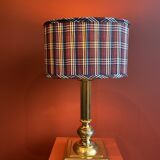 Lamp base in gilded brass, oval silk lampshade with a checkered pattern in burgundy.