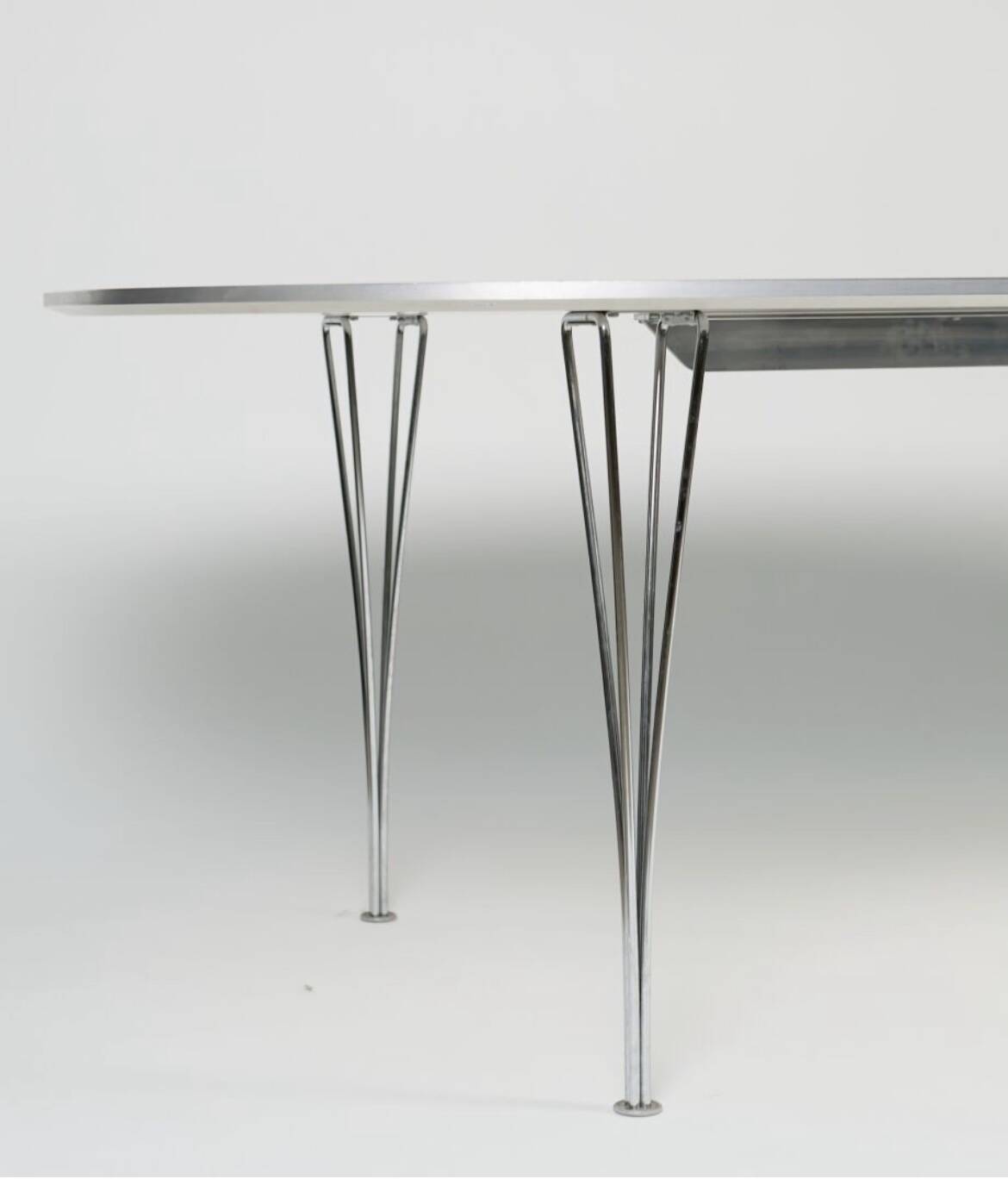 Dining table by Bruno Mathsson and Piet Hein