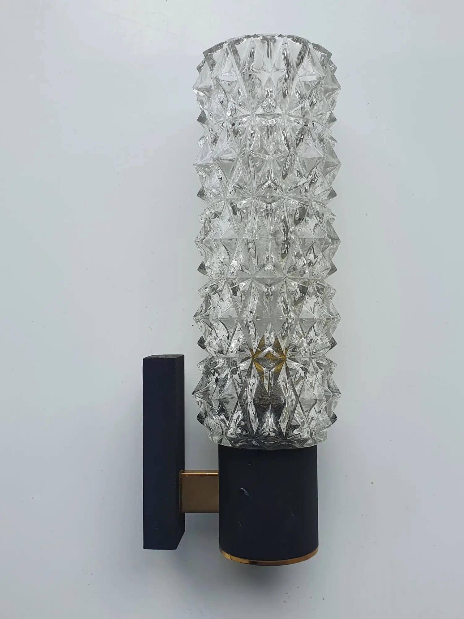 Black wall light with structured glass in Arlus style