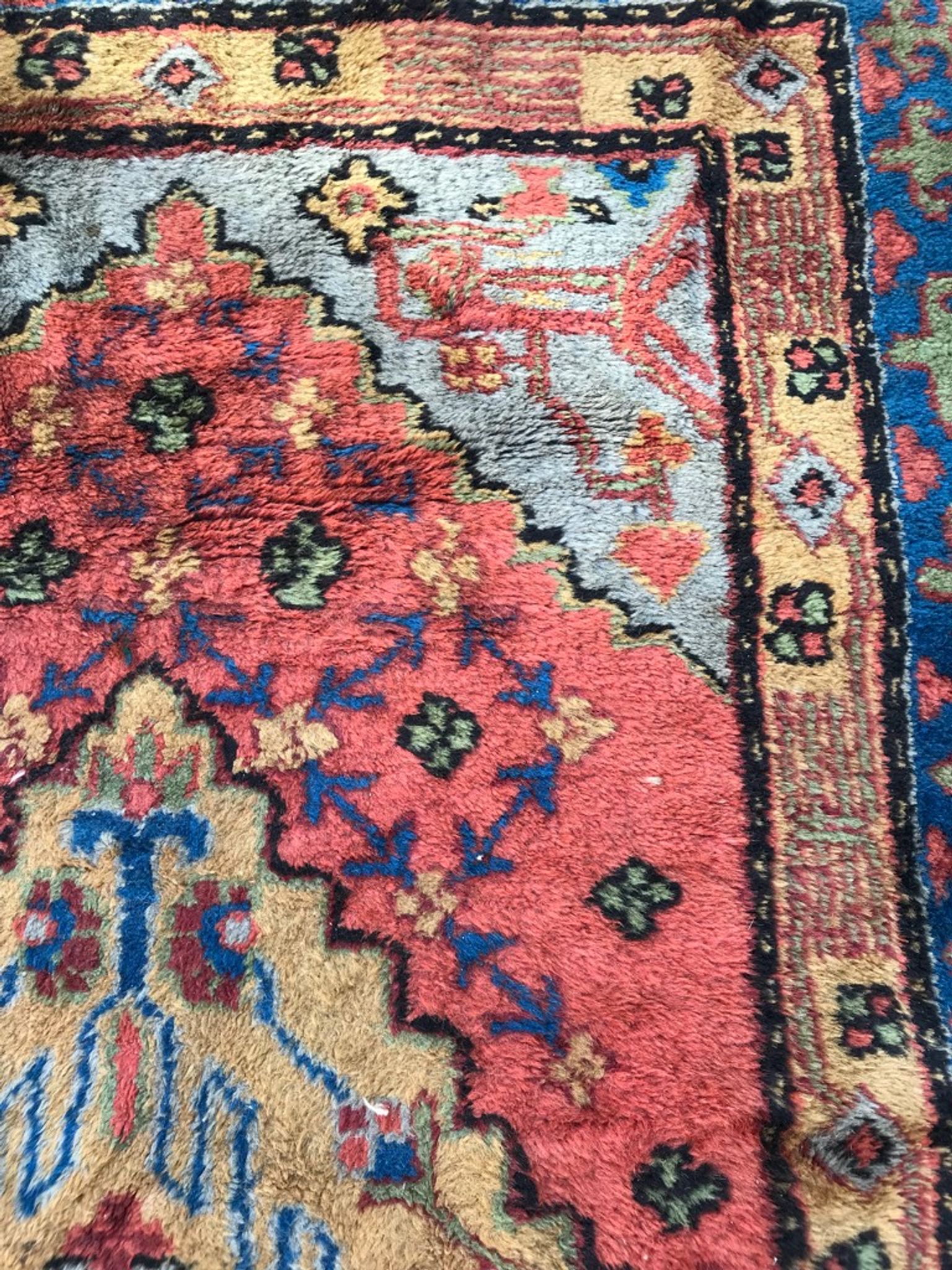 Old sinkiang oriental rug handmade 68 x 139 cm