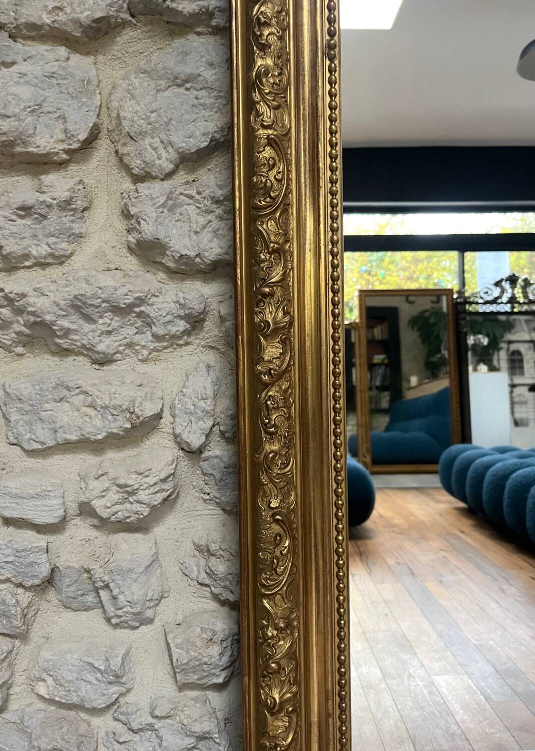 Antique mirror 183.5/116cm with pediments and pearl detailing in gold leaf.