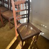 6 carved wooden chairs with cane seats