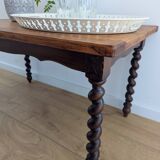 Solid wood coffee table with carved twisted legs