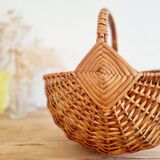 Small old basket with floral fabric interior