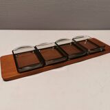 Teak Cabaret tray with four smoke coloured glass bowls, Danish and produced by Wiggers 1970s.