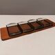 Teak Cabaret tray with four smoke coloured glass bowls, Danish and produced by Wiggers 1970s.