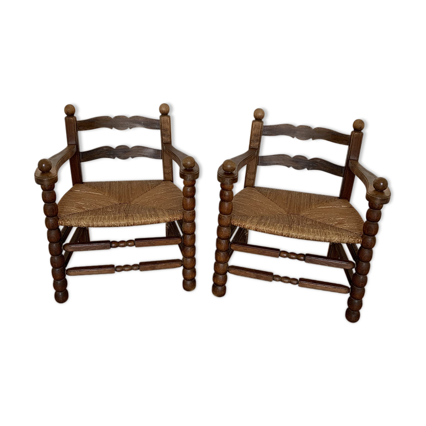 2 mulched armchairs in turned wood