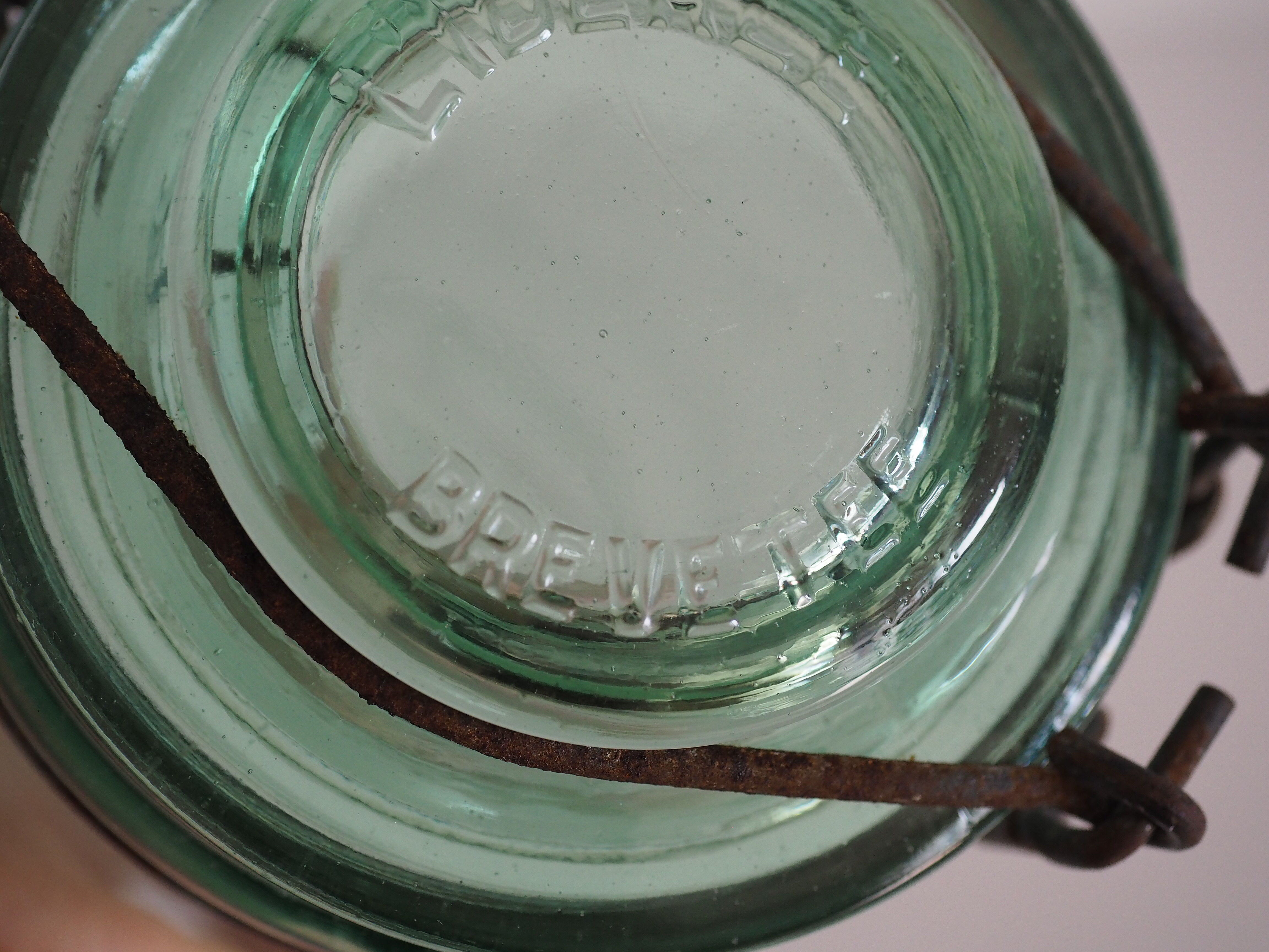 Green "ideale" glass canning jar