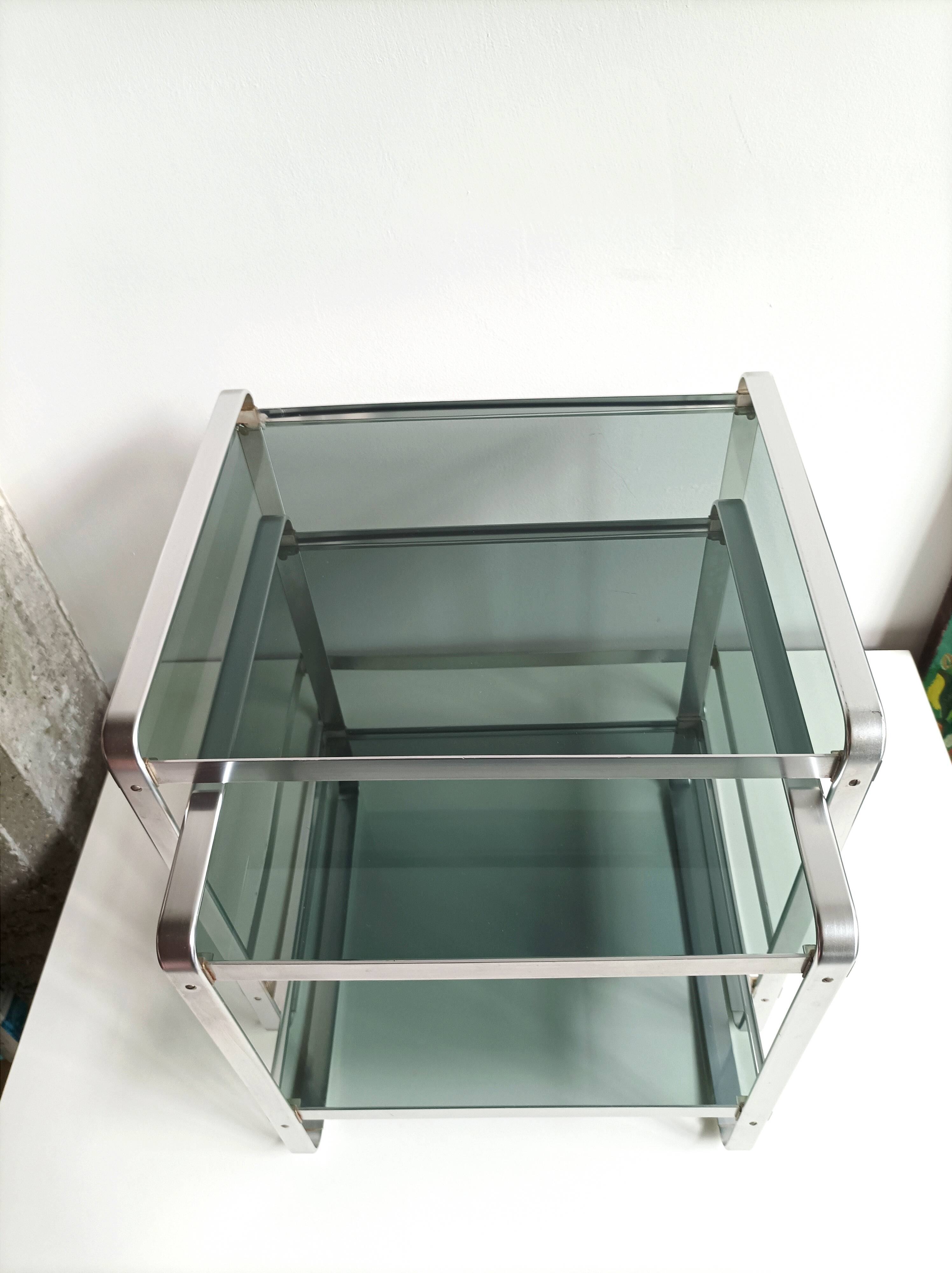 Nested tables in aluminium and smoked glass by Martini & Rossi, 1970s.