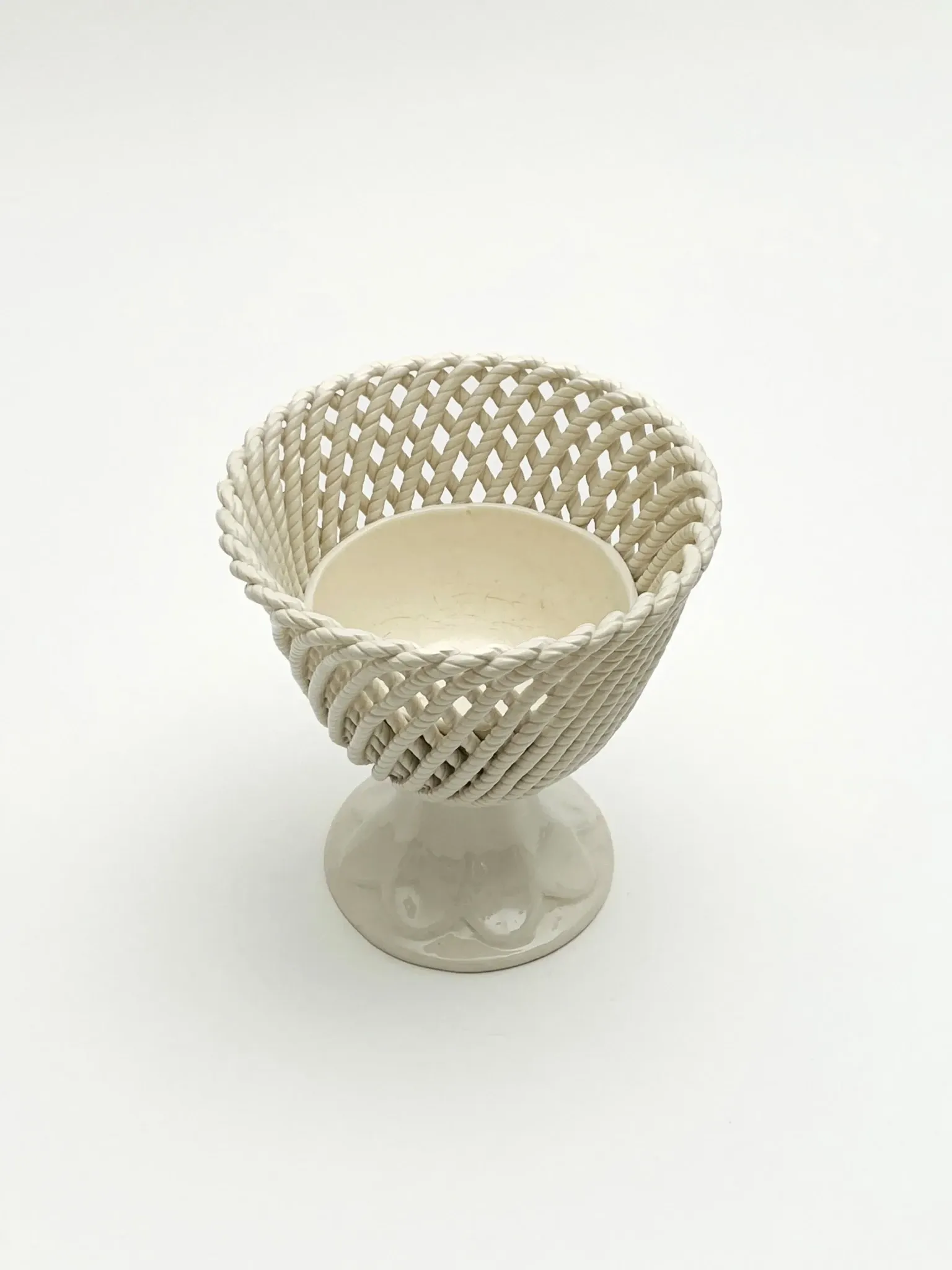 Openwork cup on pedestal