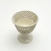 Openwork cup on pedestal