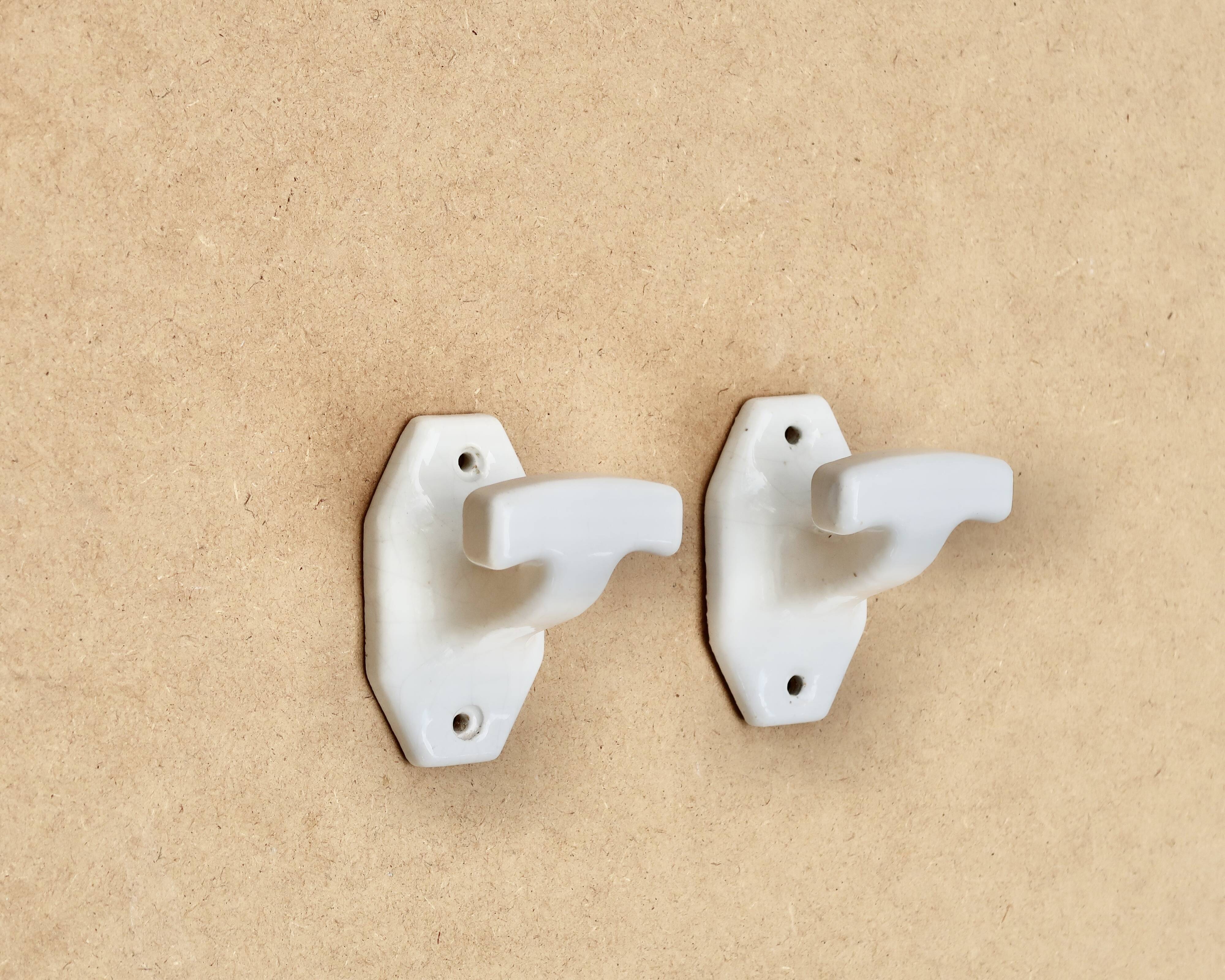 White porcelain coat hooks, 1950s
