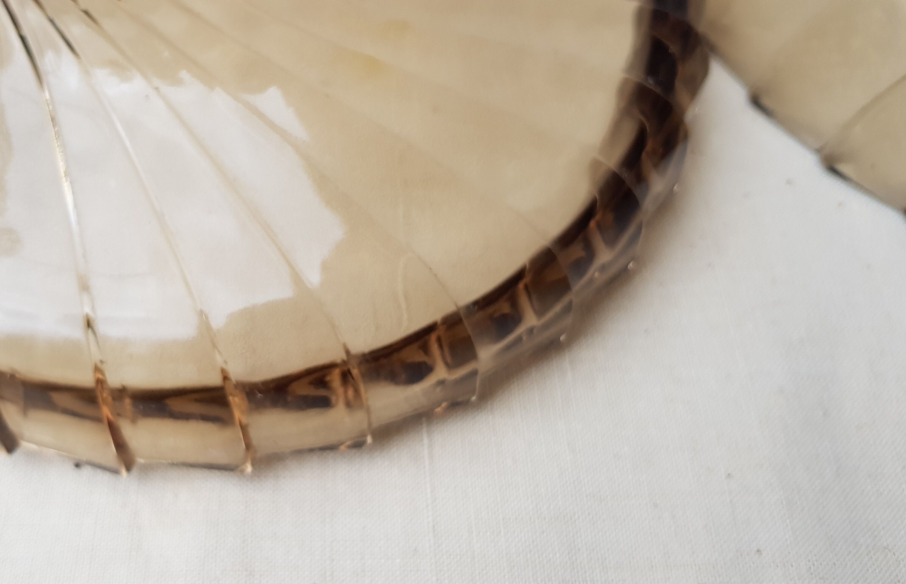 Empty amber glass pocket with lid