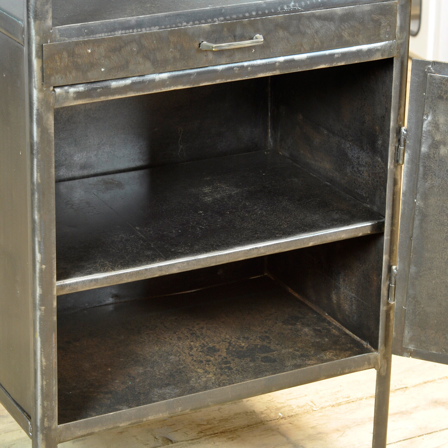 Polished iron medicine cabinet, 1950s