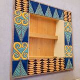 Enamelled lava mirror