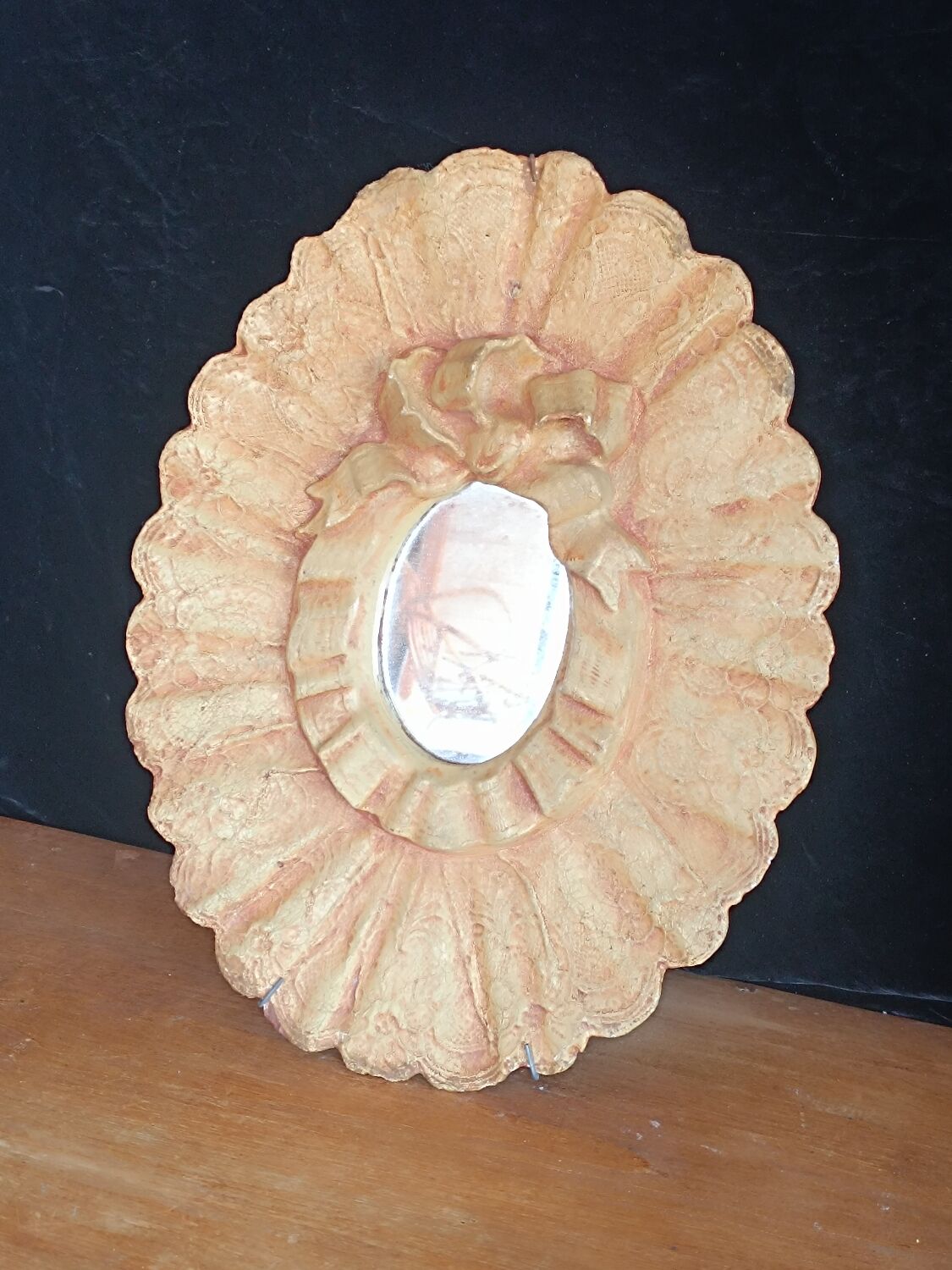 Painted oval plaster mirror