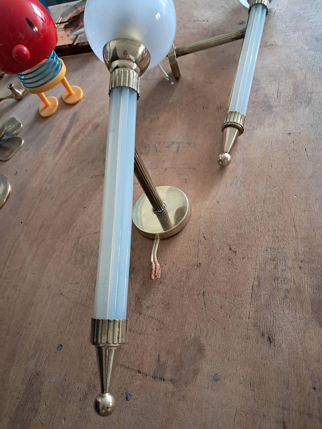 Pair of brass and glass wall sconces