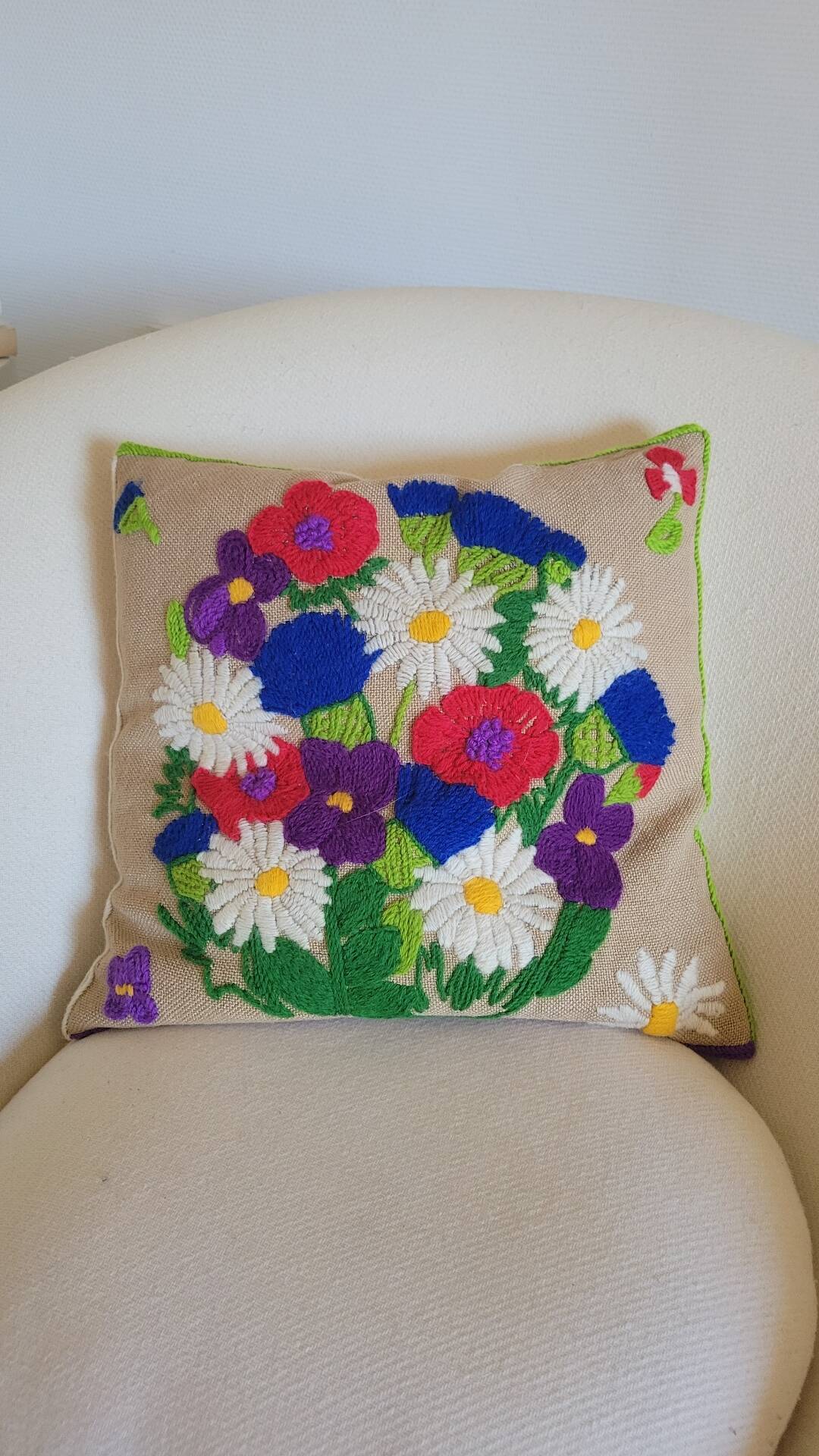 Vintage embroidered cushion
