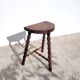 Tabouret vintage à chapelet tripode