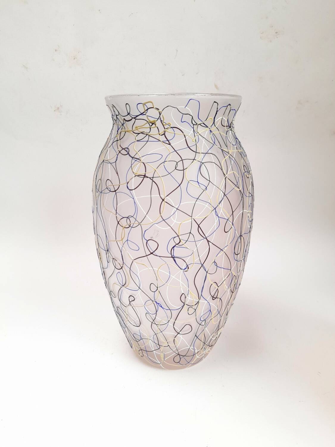 Large glass vase from Murano with coloured filaments.