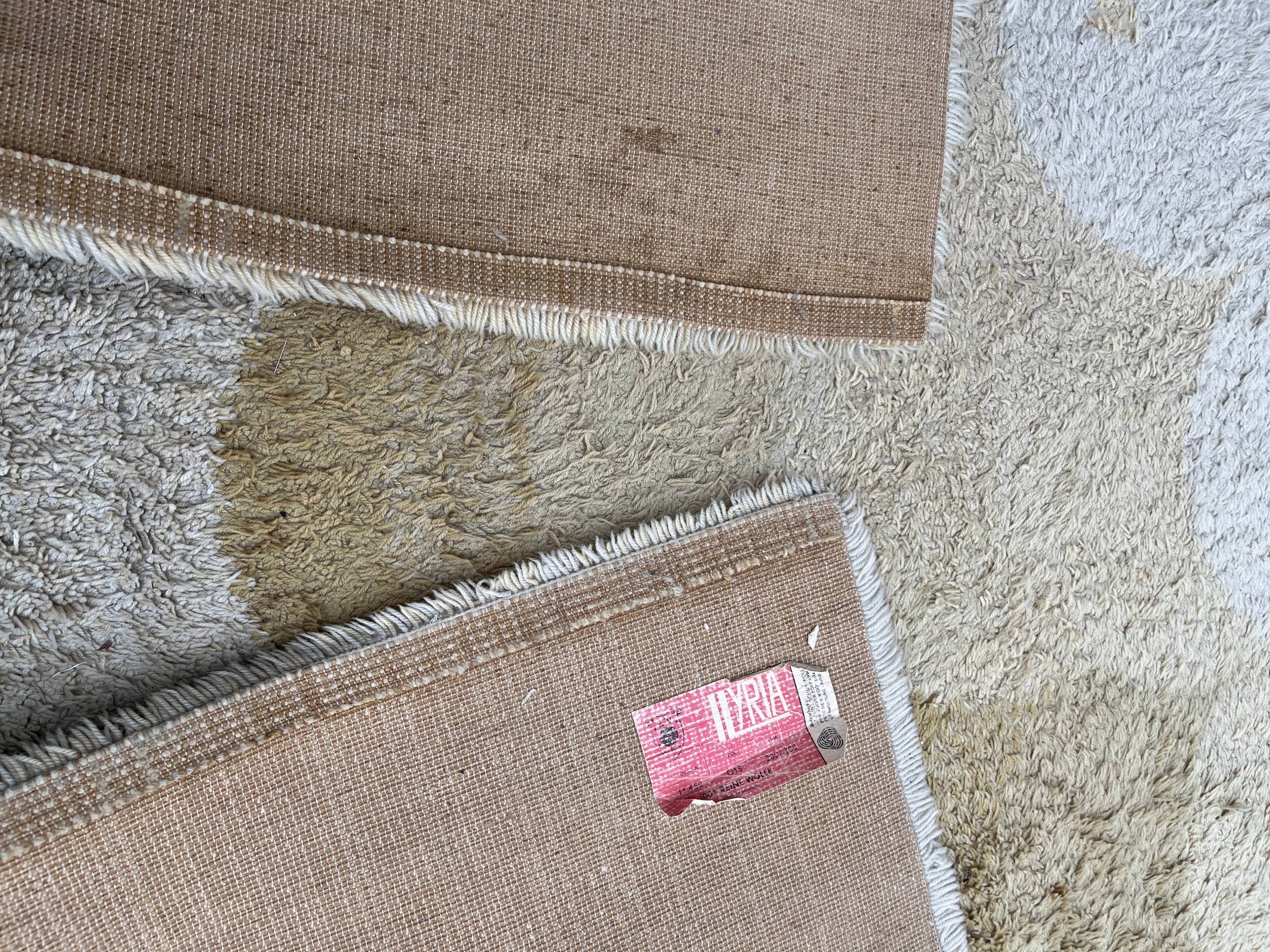 Large rug with floral decoration.