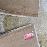 Large rug with flower decoration.