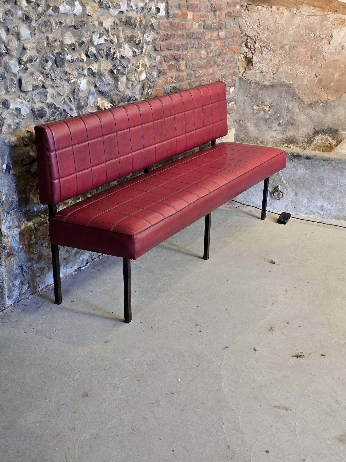 1960s double bistro bench in buttoned burgundy red skai