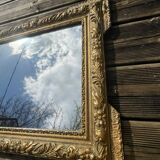 Miroir en bois et stuc doré