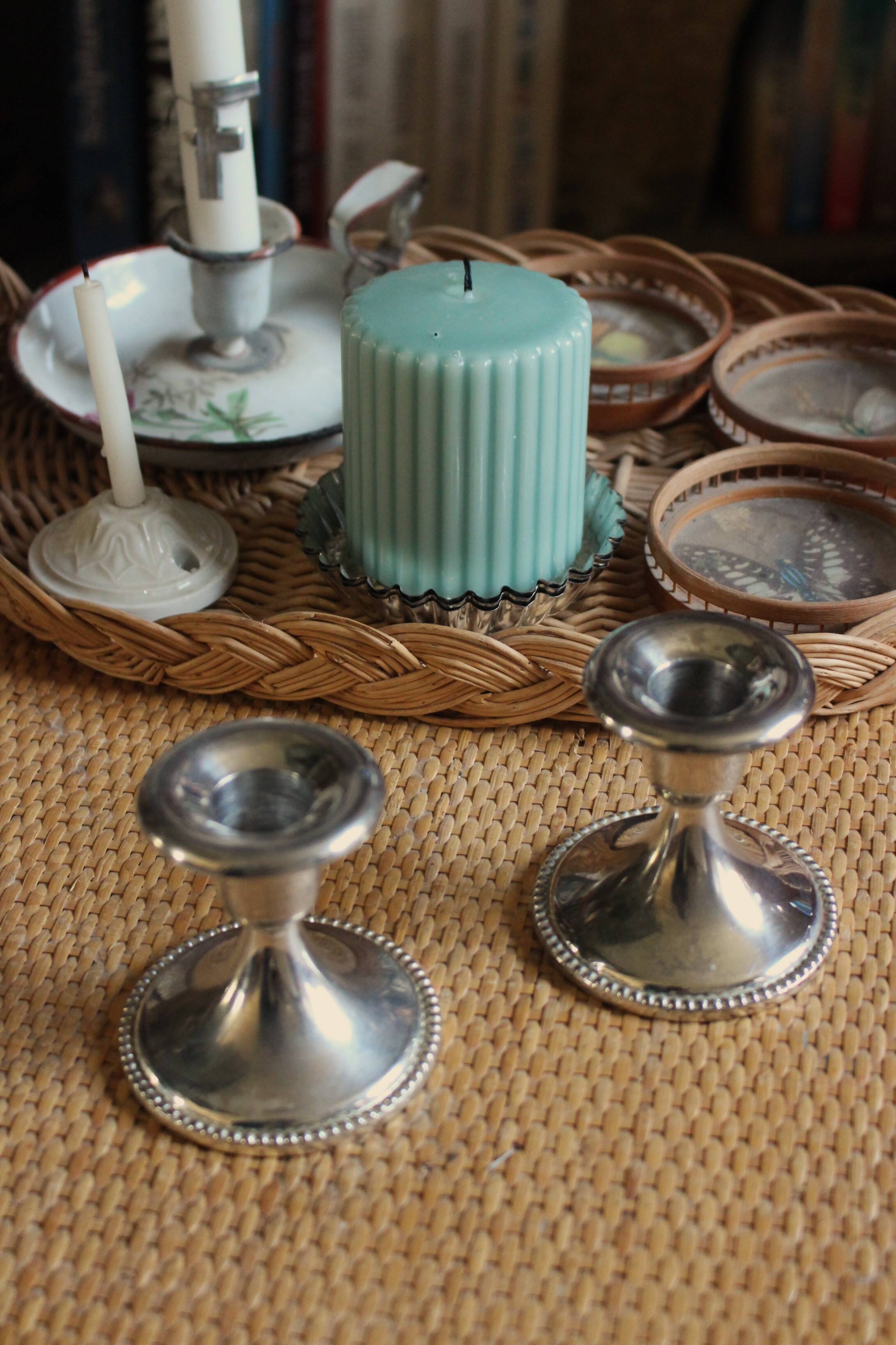 Pair of chrome metal candlesticks