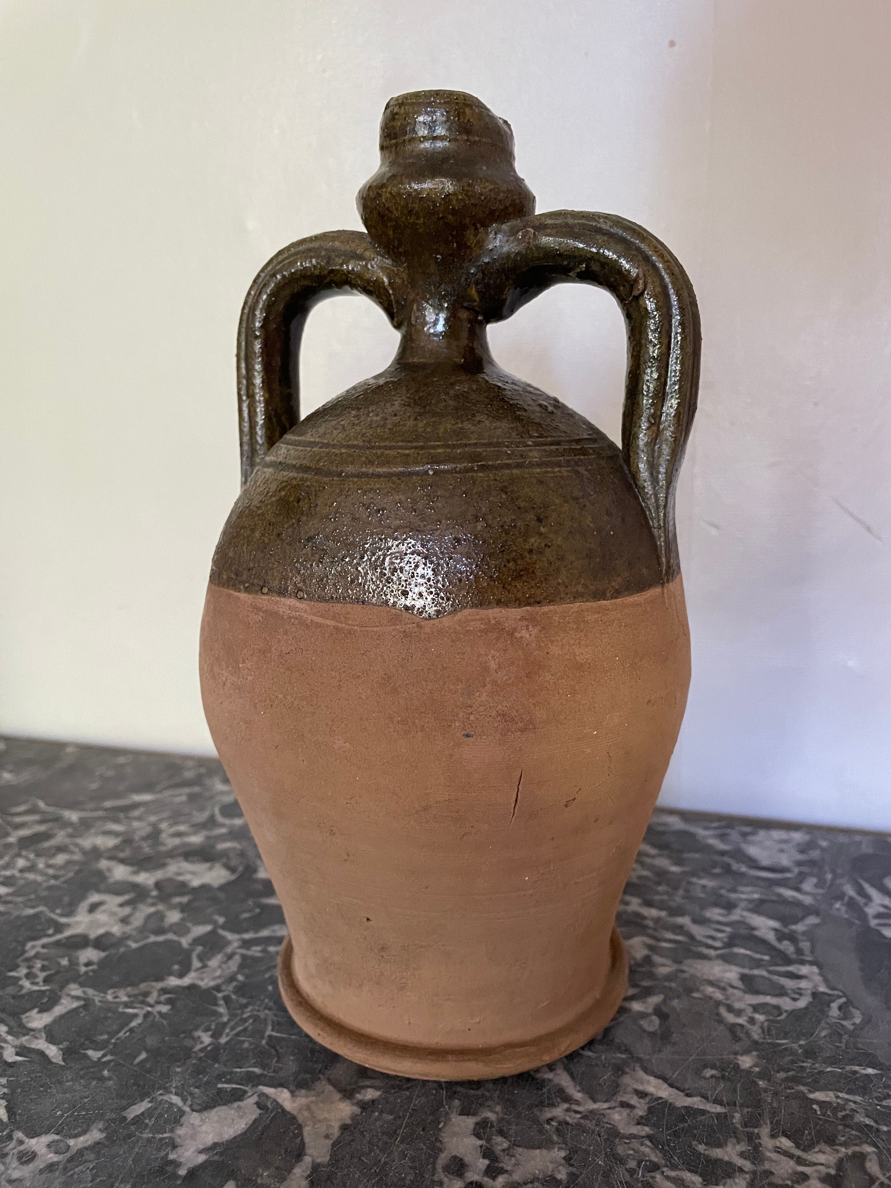 Persimmon glazed terracotta oil jar