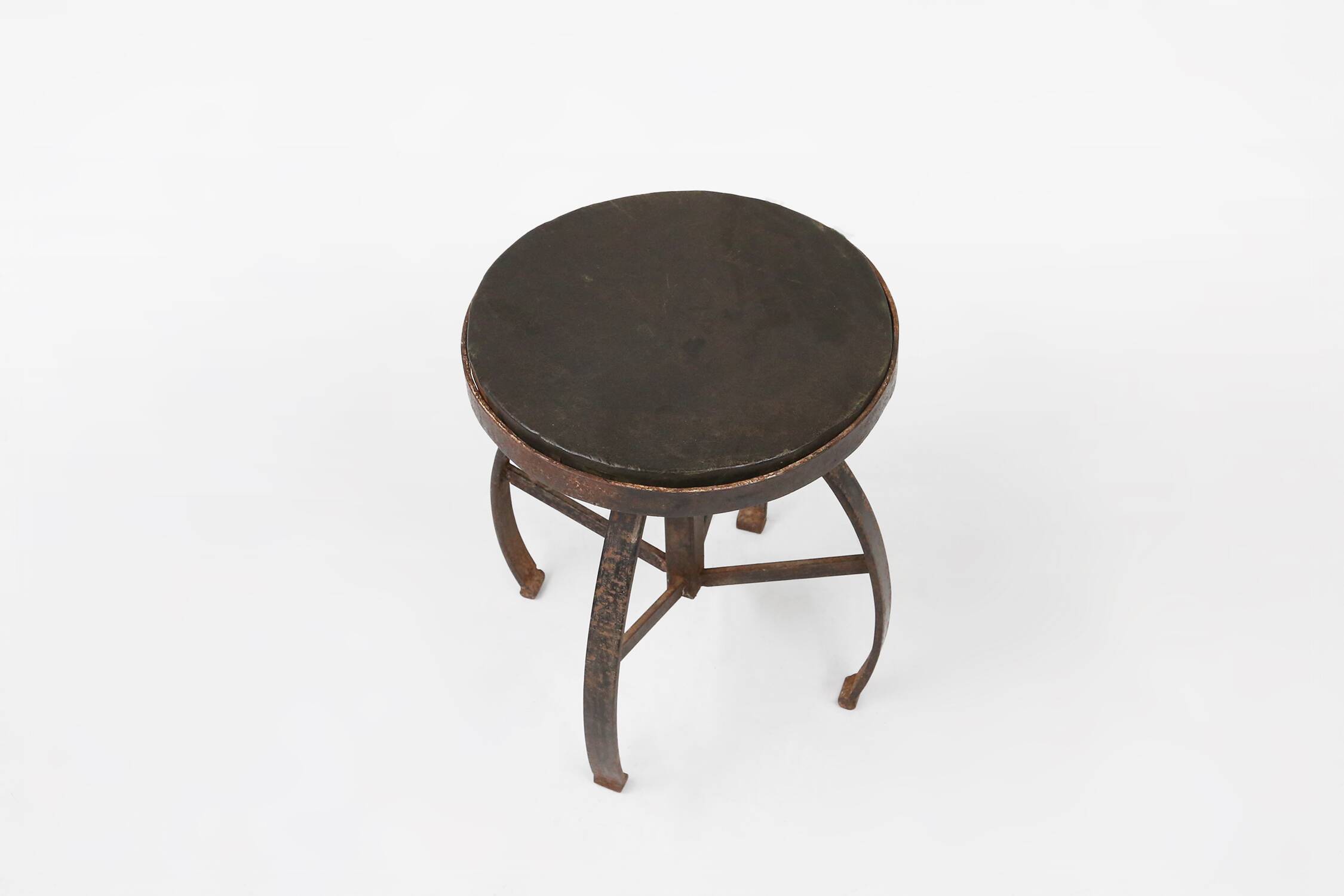 Industrial black metal stool with unique frame, France ca. 1920