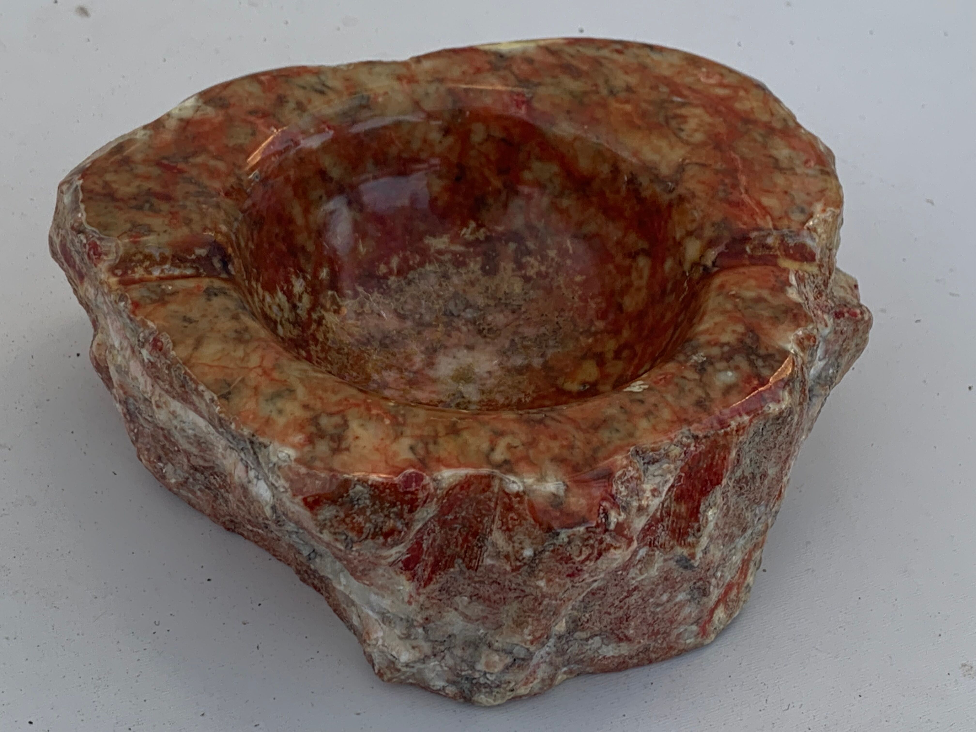 Ashtray in marble stone of vintage cherry color