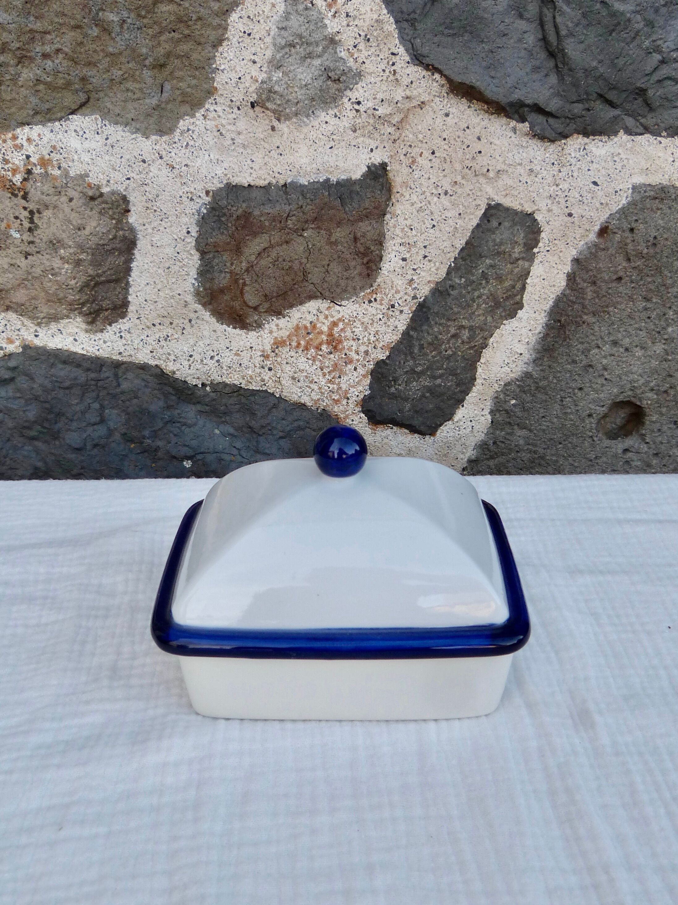 White and blue ceramic butter dish