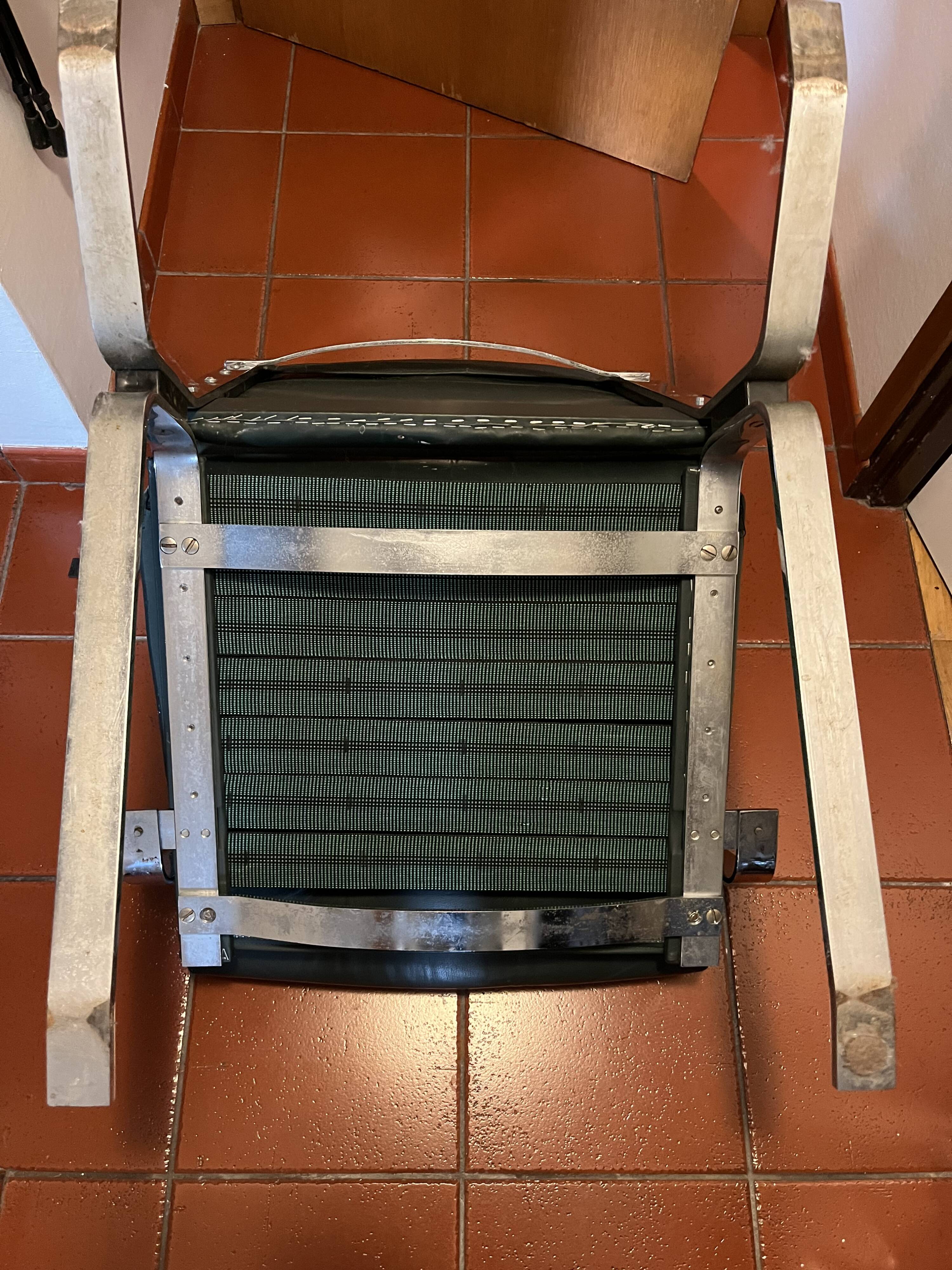 Green leather and chrome lounge chair, 1970s