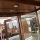 Wooden display case and half-moon mirror
