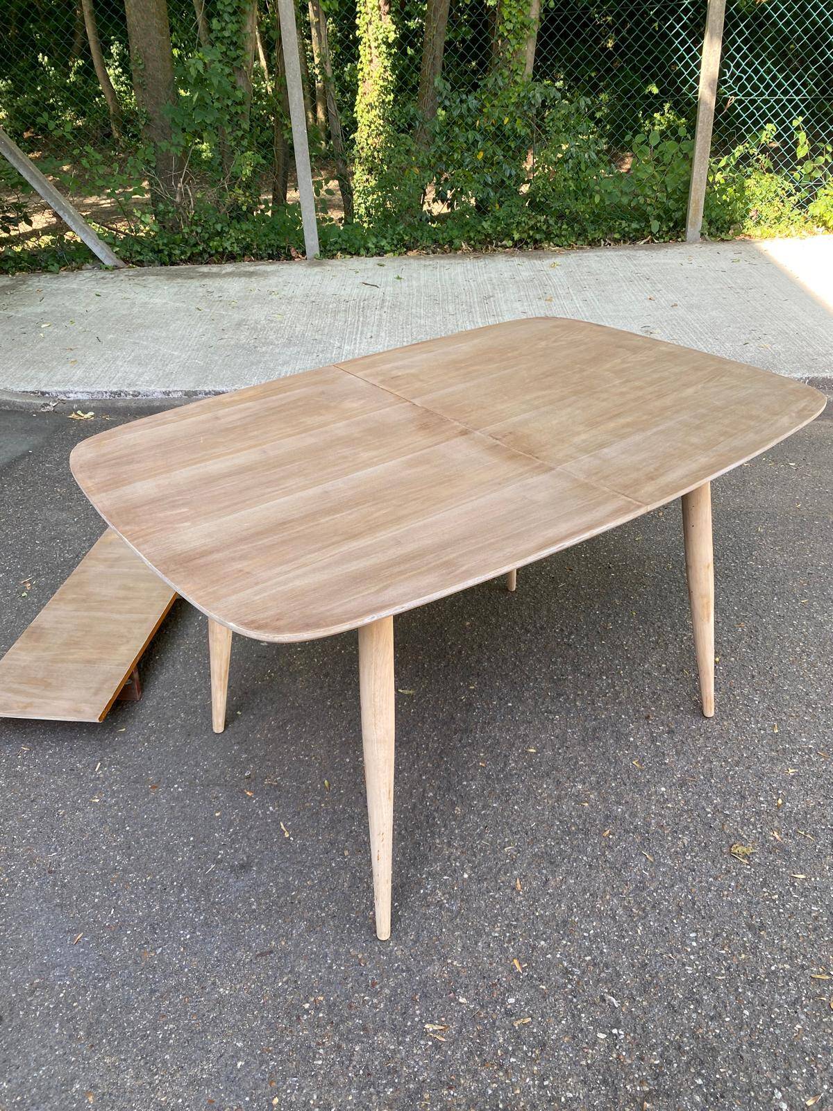 Renovated Scandinavian extendable dining table in teak and veneer from 1980.
