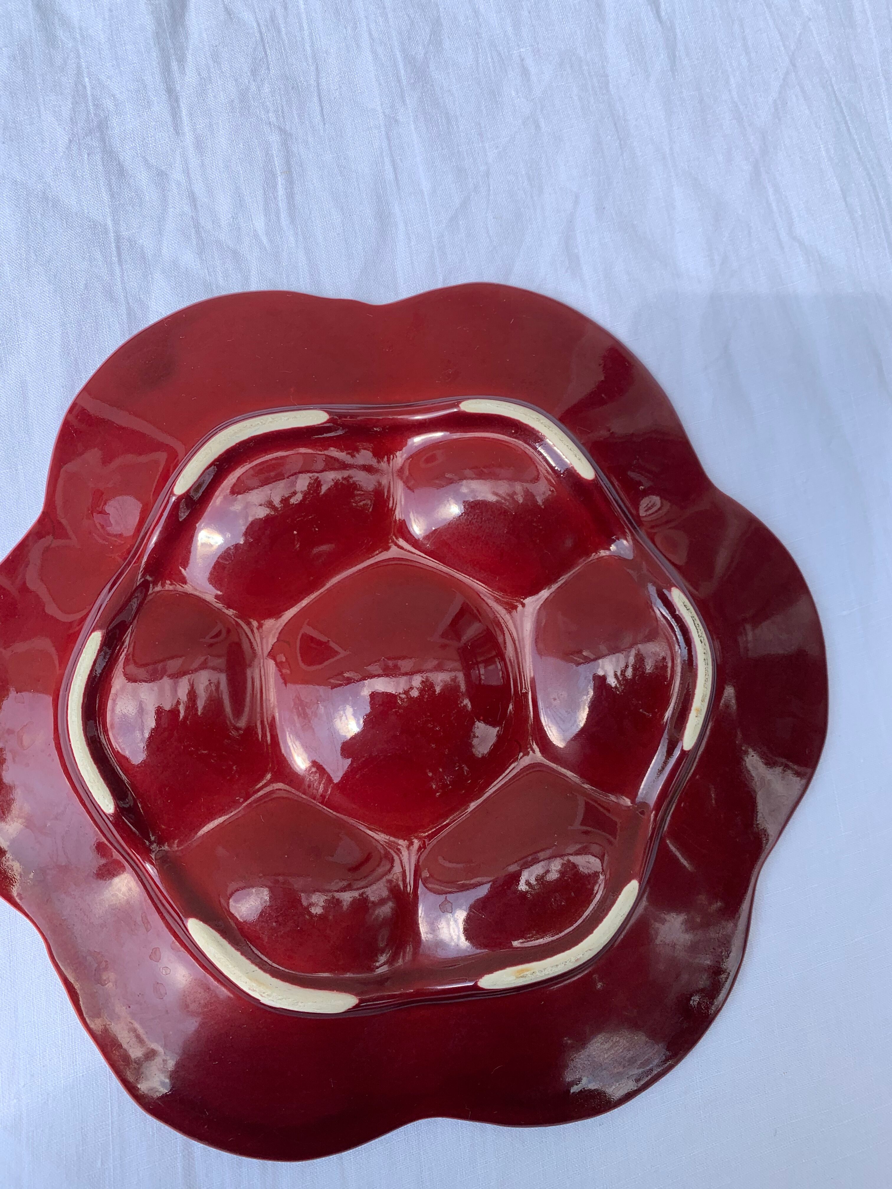 4 oyster plates in vintage red glazed ceramic slip and collector
