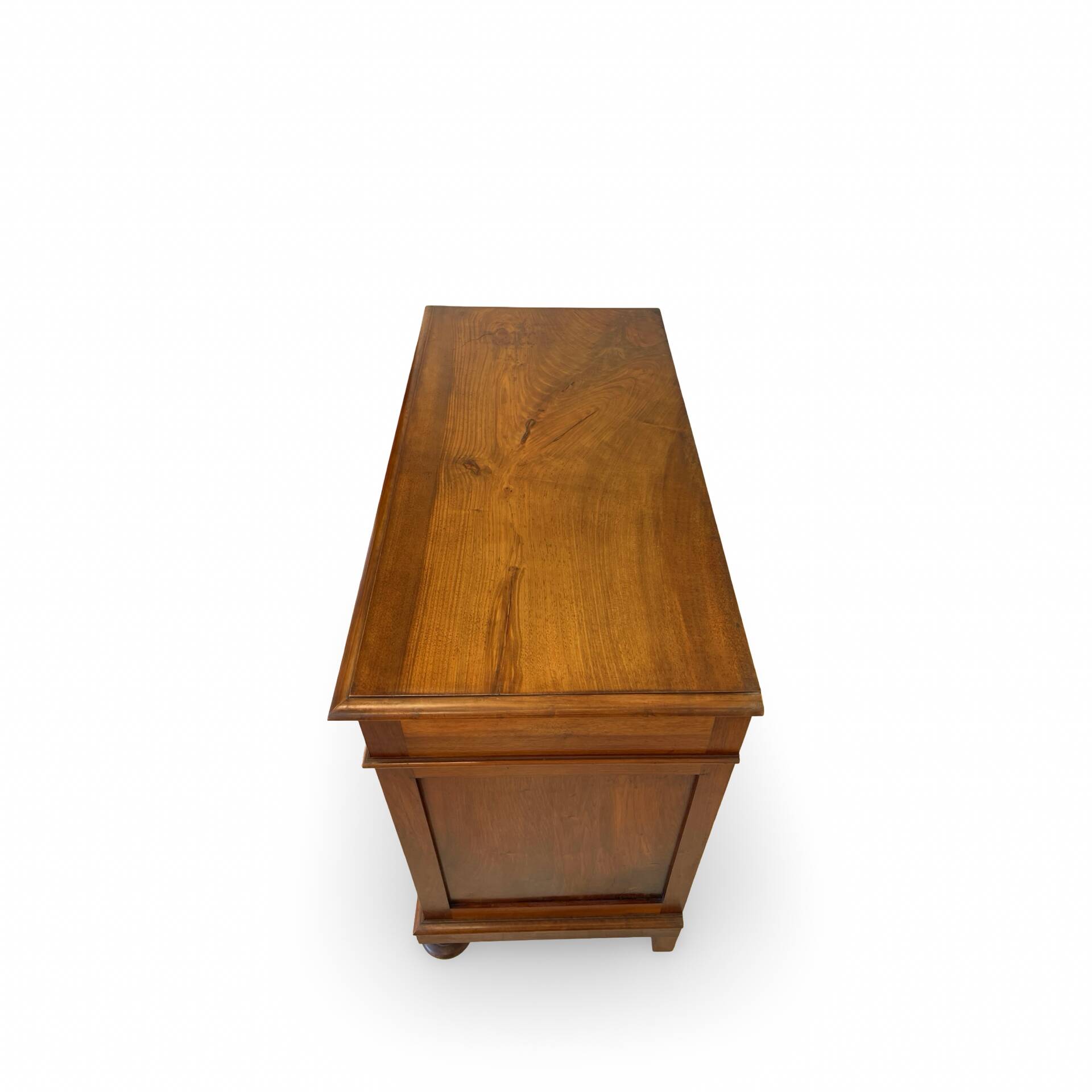 Antique walnut commode with bronze handles in the shape of a lion's mask,