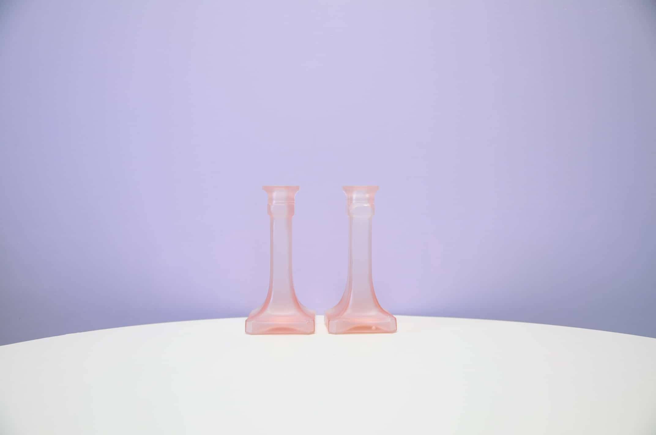 Set of 2 pink glass candlesticks